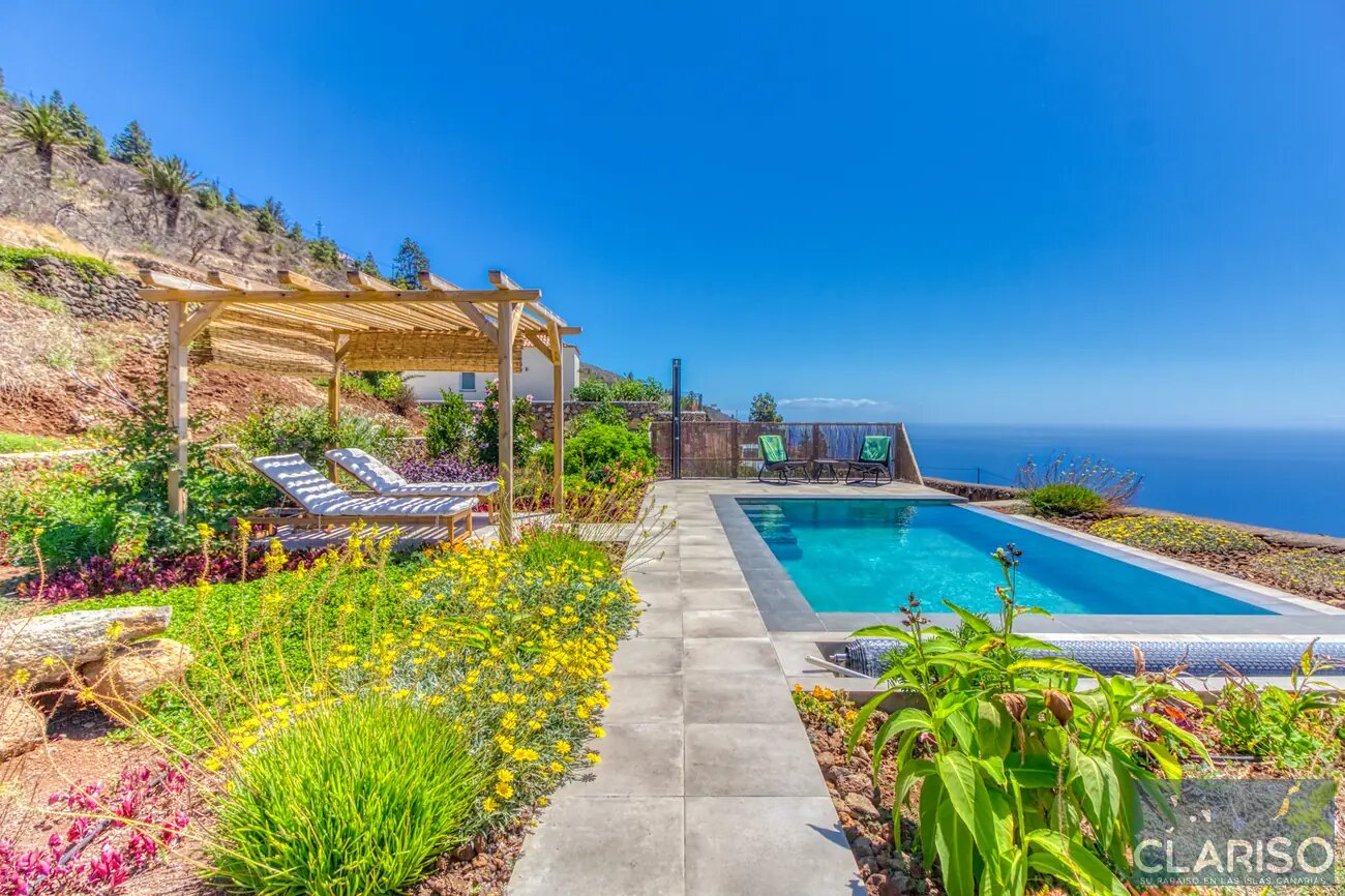 Casa Afuera: Modernes Ferienhaus mit solargeheiztem Infinity-Pool auf garantierten 24–28 °C in Tijarafe auf La Palma