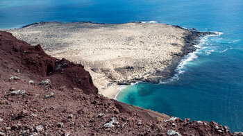 Ausblick vom Montaña Amarilla auf die Landzunge vor der Playa de la Cocina