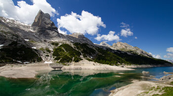 Spiegelung der Marmolata im Fedaia-Stausee