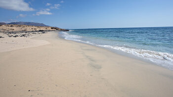 feiner Sandstrand an der Punta de la Carniceria bei El Puertito