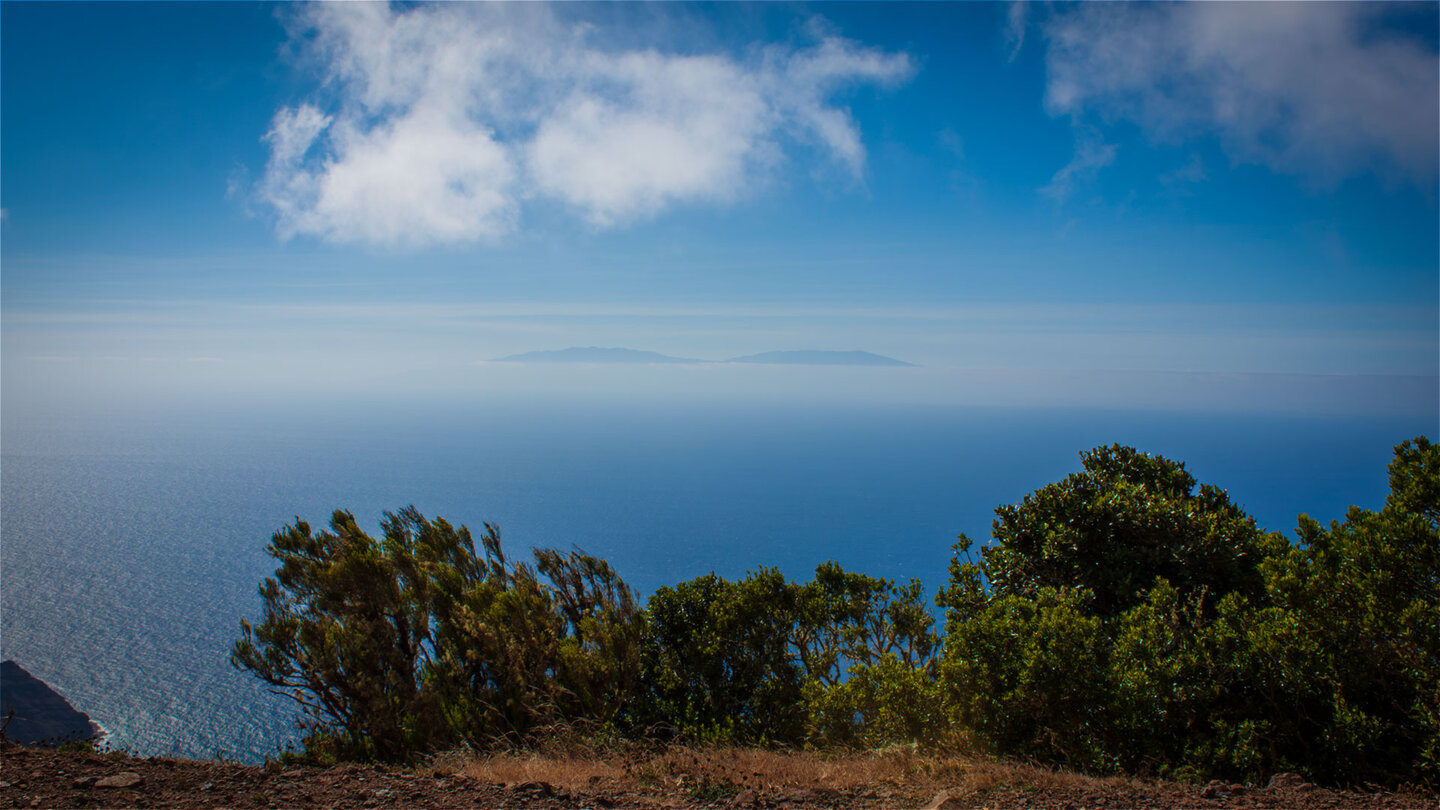 Fernblick von der Cumbre de Chijeré zur Silhouette La Palmas.