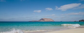 kristallklares Wasser am Strand Playa de las Conchas