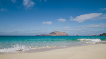 kristallklares Wasser am Strand Playa de las Conchas